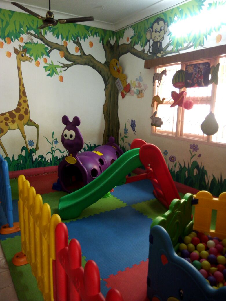 Indoor play room with slide, tunnel and ball pool at Mrs Reena's Cocoon Play School, Ramapuram